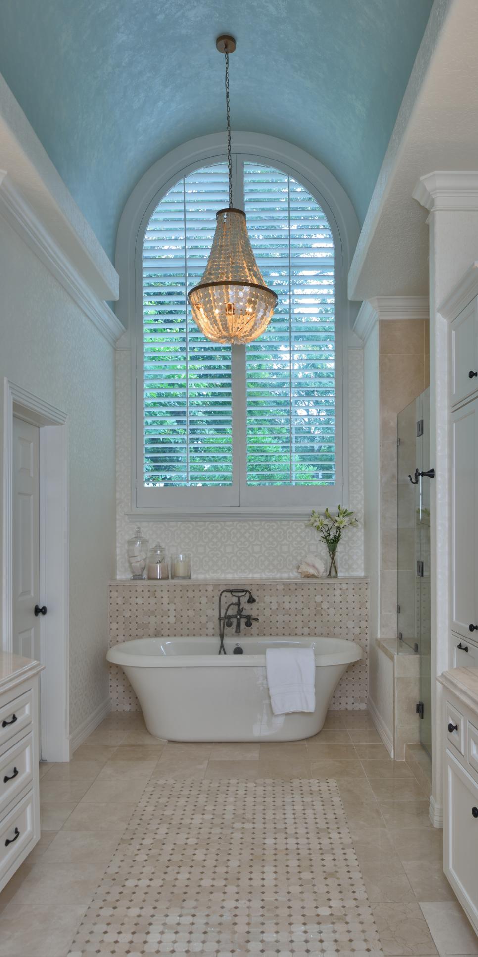 Luxe Master Bathroom With Bathtub and Chandelier HGTV