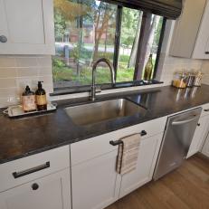 Updated Kitchen With Dark Granite Countertops