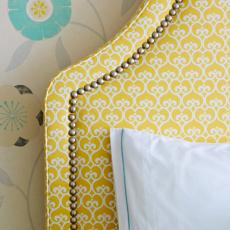 Girls' Bedroom Features Layered Patterns in Yellow and Aqua