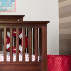 Traditional Crib With Nautical Sheet, Life Preserver Pillow