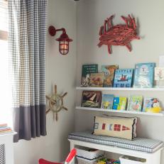 Kid's Nautical Bedroom With Bookshelves and Storage Bench