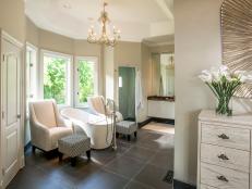 Neutral Spa Bathroom With Two Wingback Chairs, Soaking Tub
