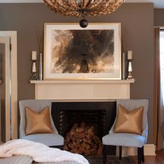 Transitional Master Bedroom With Chandelier and Fireplace