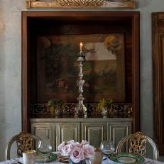 Classically Styled Dining Room With Inset Antique Buffet and Mural