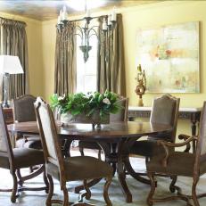 Yellow Dining Room With Traditional Table and Chairs