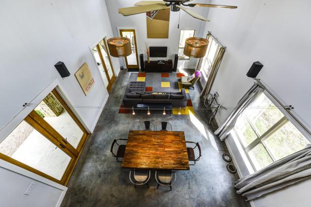 White Modern Living and Dining Space With Two-Story Ceiling