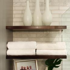 Marble Bathroom Wall With Floating Espresso Shelves