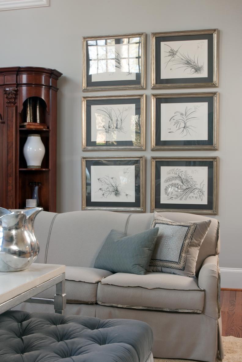 Neutral Transitional Living Room With Framed Art and Gray Accents