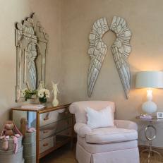 Twin Girl Nursery With Silver Angel Wings, Mirrored Dresser and Pink Armchair