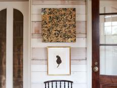 White Country Entryway With Chair, Artwork and Iron Lantern