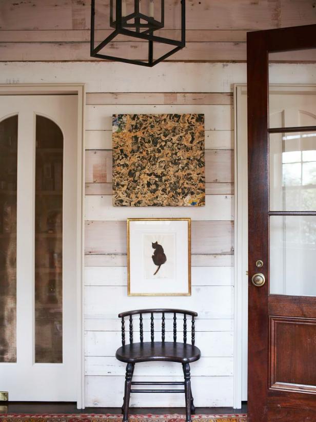 White Country Entryway With Chair, Artwork and Iron Lantern