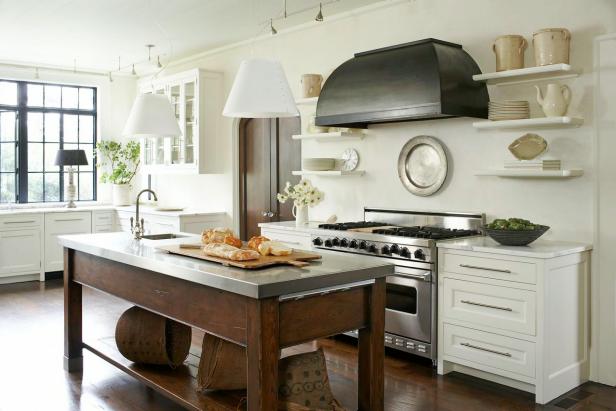 White Kitchen With Brown Wood Island and White Pendants