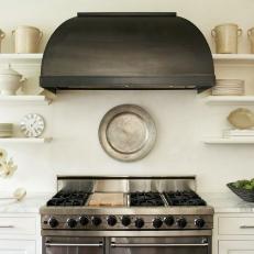 Gray Industrial-Style Range Hood in Fresh White Kitchen