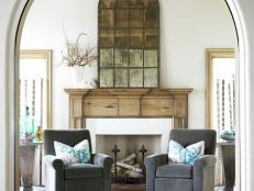 Large Arched Doorway Frames Stylish White Living Room