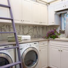 Quaint White Laundry Room With Purple Ladder