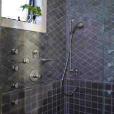 Blue-Grey Stone Tile Shower With Marble Encased Window