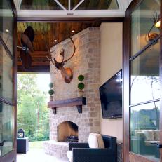 Outdoor Living Area With Beautiful Stone Fireplace
