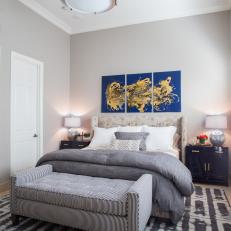 Blue Art Adds Pizzazz to Soft Gray Bedroom