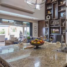Gorgeous Granite Island Divides Kitchen and Living Space