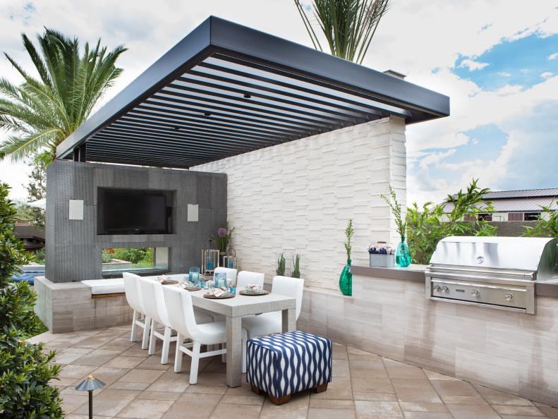 Contemporary Outdoor Dining Area With Grill and Pergola