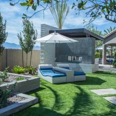Blue Chaise Lounge in Private Backyard