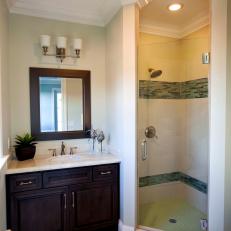 Soft Green Guest Bathroom With Walk-In Shower