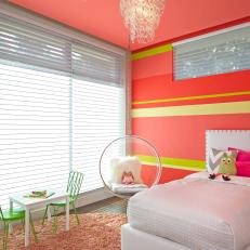 Modern Pink Girl's Room With Bright Striped Accent Wall