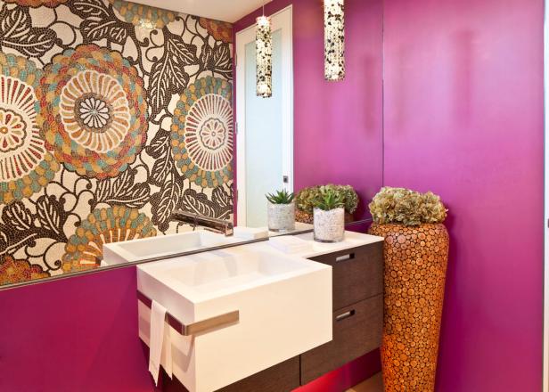 Eclectic Magenta Bathroom With Patterned Accent Wall and Small Vanity