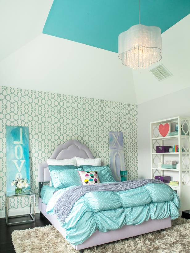 Girl's Bedroom With Lavender Bed and Blue Bedding