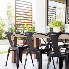 Tropical Outdoor Dining Area With Contemporary Seating