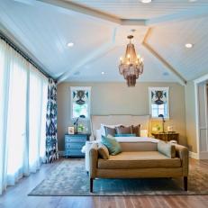 Open And Airy Traditional Bedroom With Tiered Chandelier
