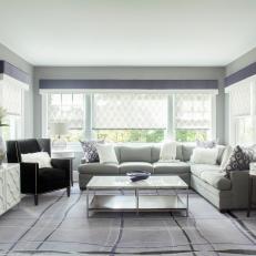 Gray Minimalist Family Room With Lavender Accents