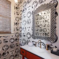 Black and White Powder Room With Fornasetti Wallpaper