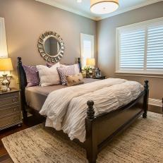 Feminine Gray Bedroom With Metallic Nightstand