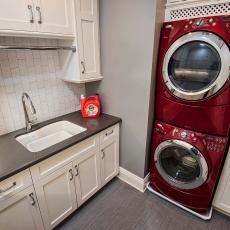 Gray Laundry Room Feels Young With Red Appliances