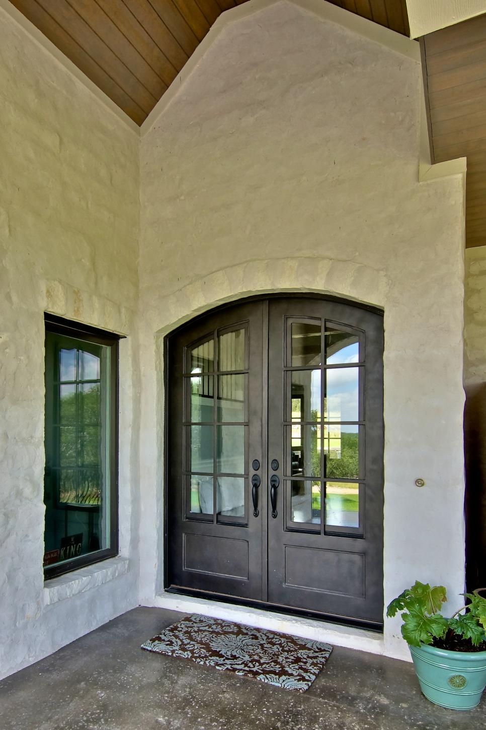 French Country Entry With Arched Doors | HGTV