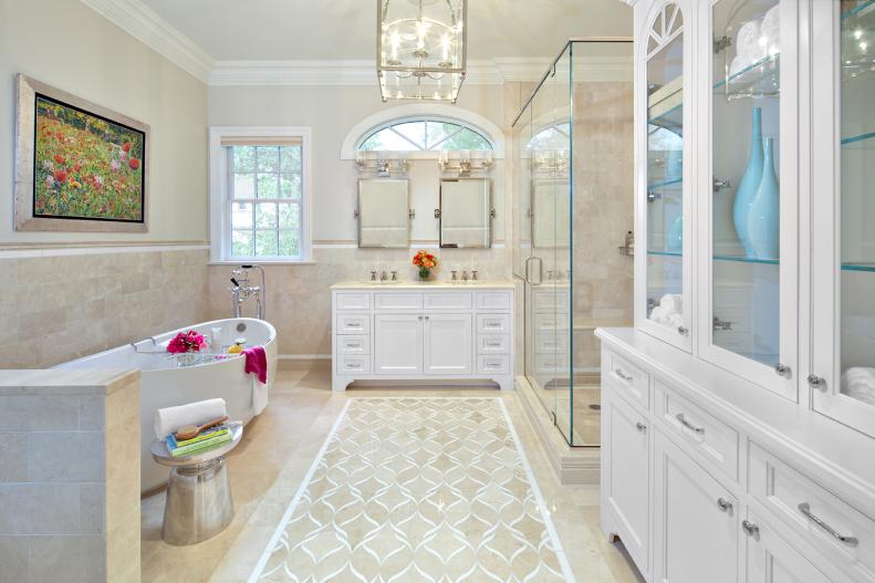 Neutral Contemporary Master Bathroom With Soaking Tub and Storage