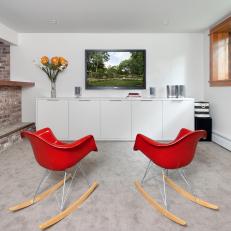 Contemporary Basement With Red Rocking Chairs