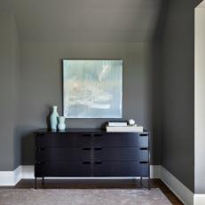 Contemporary Master Bedroom With Dark Brown Dresser