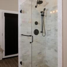 Timeless Glass-Enclosed Shower With Marble Tile