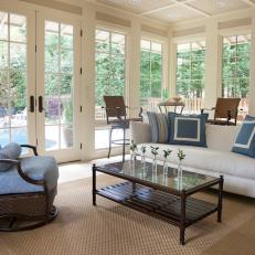 Neutral Living Room With White Windows and French Doors