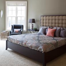 Luxurious Gray Guest Bedroom With Beige Upholstered Headboard 