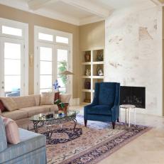 Transitional Living Room With Marble Fireplace
