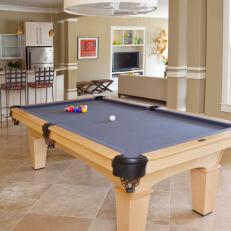 Neutral Transitional Game Room With Pool Table and Drum Light