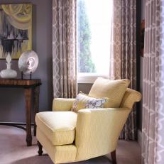 Charming Yellow Armchair in Gray Guest Room