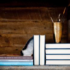 Rustic Wood Shelf Holds Small Collection of Books