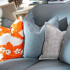 Contemporary Gray Sofa With Patterned Accent Pillows