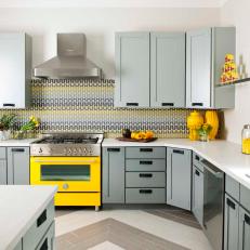 Contemporary Gray Kitchen With Bright Yellow Oven