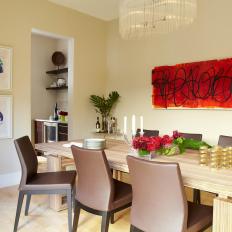 Modern Dining Room With Vibrant Red Artwork