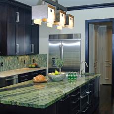 Contemporary Kitchen With Green Island Countertop